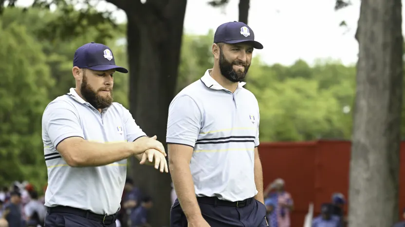 Tyrrell Hatton and Jon Rahm of Team Europe walk the ninth hole during the morning foursomes of the Ryder Cup at Bethpage Black Golf Course on Friday, September 26, 2025 in Farmingdale, New York. (Photo by Charles Laberge/LIV Golf)