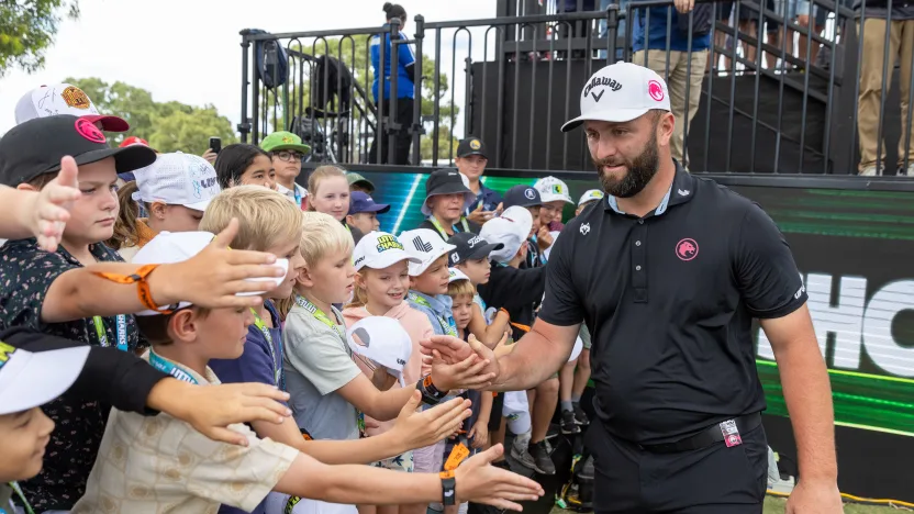 Captain Jon Rahm of Legion XIII high fives Little Sharks on the first tee during the final round of LIV Golf Adelaide at Grange Golf Club on Sunday, February 16, 2025 in Adelaide, Australia. (Photo by Jon Ferrey/LIV Golf)