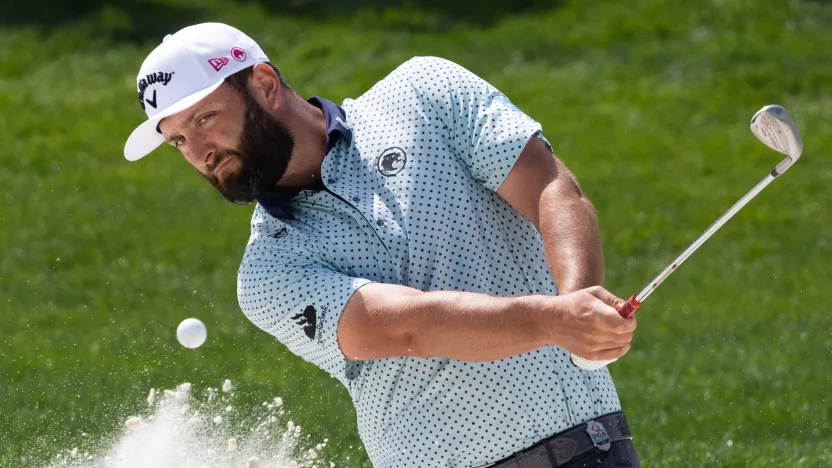 Captain Jon Rahm of Legion XIII hits his shot from a bunker on the first hole during the first round of the 2025 PGA Championship at Quail Hollow Club on Thursday, May 15, 2025 in Charlotte, North Carolina. (Photo by Jon Ferrey/LIV Golf)