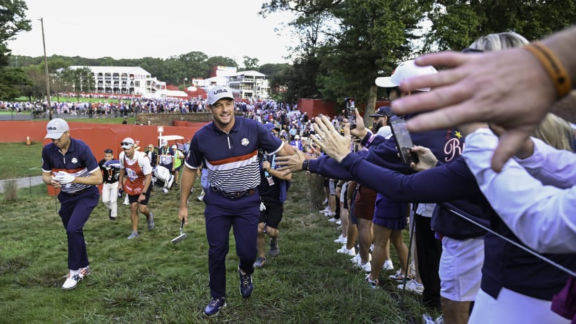 Bryson DeChambeau of Team USA high fives fans during the morning foursomes of the Ryder Cup at Bethpage Black Golf Course on Friday, September 26, 2025 in Farmingdale, New York. (Photo by Charles Laberge/LIV Golf)