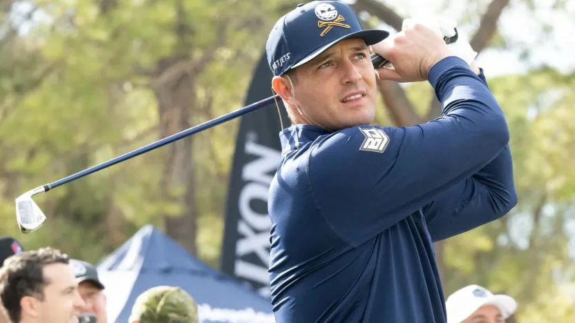 Captain Bryson DeChambeau of Crushers GC hits his shot on the driving range before the Showdown at the Shadow Creek Golf Course on Monday, Dec. 16, 2024 in Las Vegas, Nevada. (Photo by Montana Pritchard/LIV Golf)