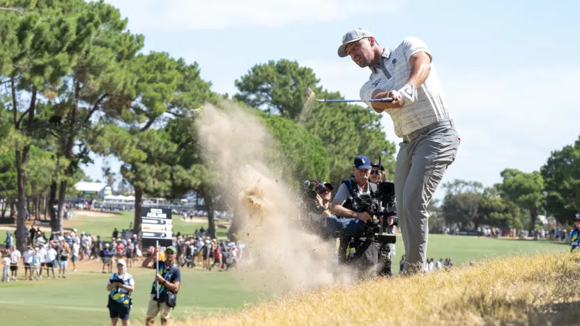 Captain Bryson DeChambeau of Crushers GC hits his shot from the rough on the 17th hole during the second round of LIV Golf Adelaide at Grange Golf Club on Saturday, February 15, 2025 in Adelaide, Australia. (Photo by Charles Laberge/LIV Golf)