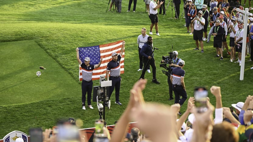 Bryson DeChambeau and Justin Thomas of Team USA hold the American Flag during the morning foursomes of the Ryder Cup at Bethpage Black Golf Course on Friday, September 26, 2025 in Farmingdale, New York. (Photo by Charles Laberge/LIV Golf)