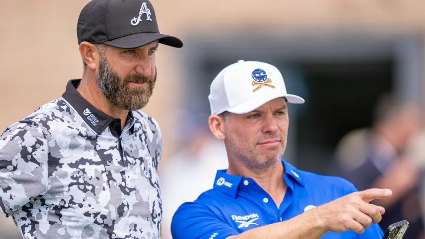 Captain Dustin Johnson of 4Aces GC and Paul Casey of Crushers GC seen on the putting green before the first round of LIV Golf United Kingdom at JCB Golf & Country Club on Friday, July 25, 2025 in Rocester, England. (Photo by Pedro Salado/LIV Golf)