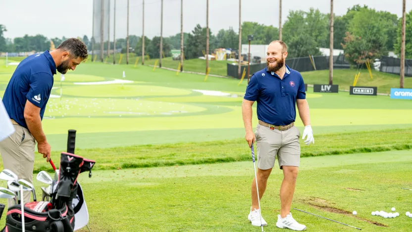 Captain Jon Rahm and Tyrrell Hatton of Legion XIII seen on the driving range during the practice round before the start of LIV Golf Team Championship Michigan at The Cardinal at Saint John’s on Tuesday, August 19, 2025 in Plymouth, MIchigan. (Photo by Charles Laberge/LIV Golf)