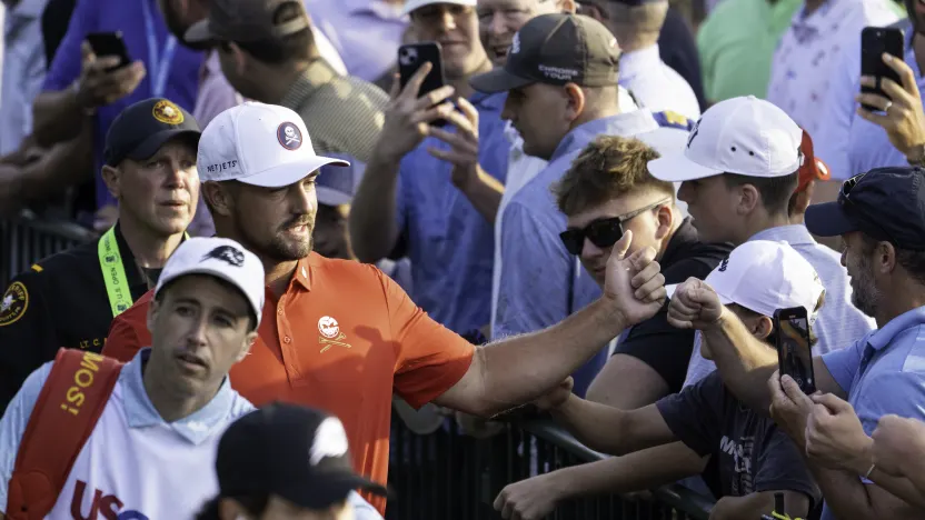 Captain Bryson DeChambeau of Crushers GC high-fives fans during the first round of the US Open at Oakmont Country Club on Thursday, June 12, 2025 in Oakmont, Pennsylvania. (Photo by Charles Laberge/LIV Golf)