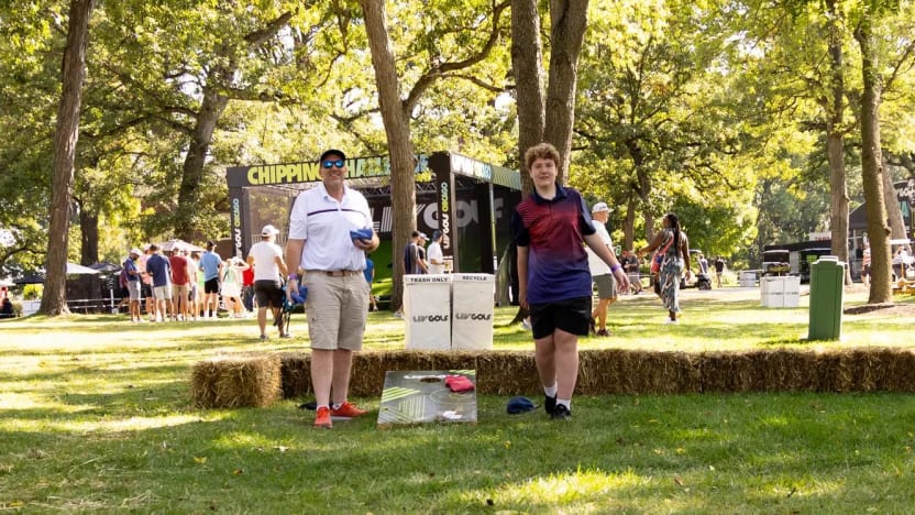 Fans play cornhole at the Fan Village during the second round of LIV Golf Chicago at the Rich Harvest Farms on Saturday, September 23, 2023 in Sugar Grove, Illinois. (Photo by Doug DeFelice/LIV Golf)