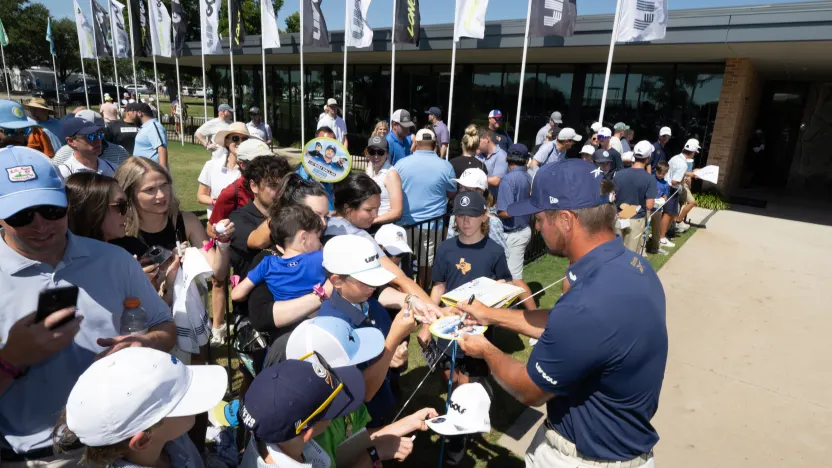 Captain Bryson DeChambeau of Crushers GC signs his autograph for fans before the final round of LIV Golf Dallas at Maridoe Golf Club on Sunday, June 29, 2025 in Carrollton, Texas. (Photo by Charles Laberge/LIV Golf)