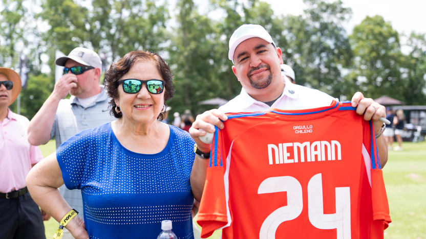 Fans poses for a photo during the first round of LIV Golf Virginia at Robert Trent Jones Golf Club on Friday, June 06, 2025 in Gainesville, Virginia. (Photo by Mateo Villalba/LIV Golf)