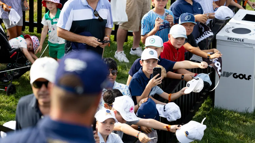 Young fans look up at Captain Bryson DeChambeau of Crushers GC before the final round of LIV Golf Chicago at Bolingbrook Golf Club on Sunday, August 10, 2025 in Bolingbrook, Illinois. (Photo by Jon Ferrey/LIV Golf)