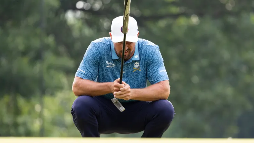 Captain Bryson DeChambeau of Crushers GC reads his putt on the 11th green during the second round of the 2025 PGA Championship at Quail Hollow Club on Friday, May 16, 2025 in Charlotte, North Carolina. (Photo by Jon Ferrey/LIV Golf)