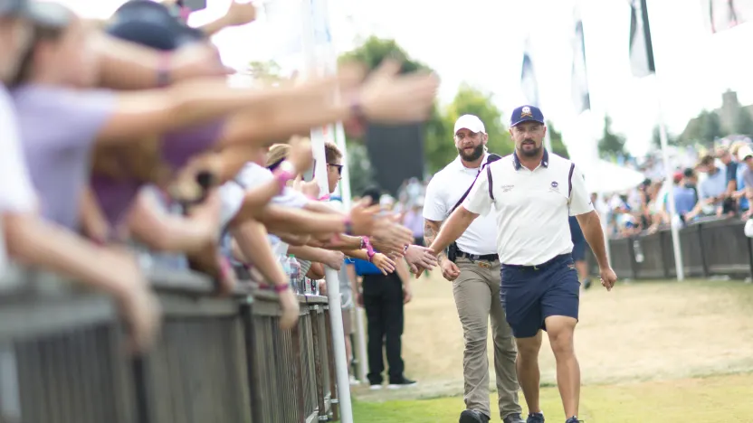 Captain Bryson DeChambeau of Crushers GC high fives fans before the second round of LIV Golf Indianapolis at The Club at Chatham Hills on Saturday, August 16, 2025 in Westfield, Indiana. (Photo by Jon Ferrey/LIV Golf)