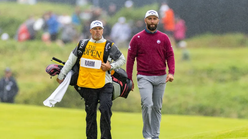 Captain Jon Rahm of Legion XIII walks with his caddie, Adam Hayes during the second round of The Open Championship at Royal Portrush Golf Club on Friday, July 18, 2025 in Portrush, Northern Ireland. (Photo by LIV Golf)
