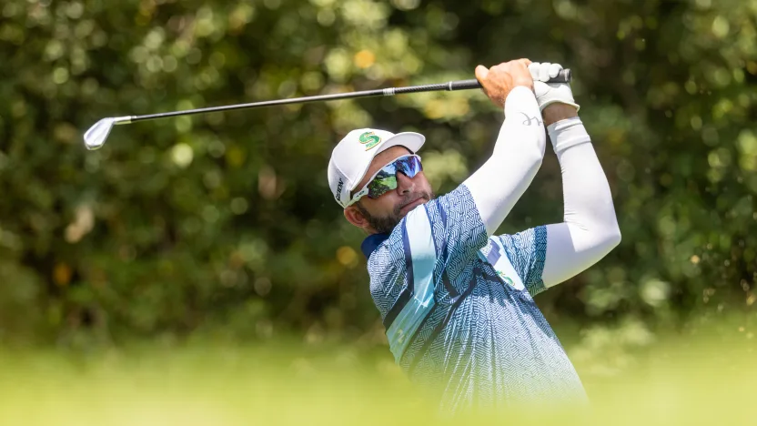 Dean Burmester of Stinger GC hits his shot from the 12th tee during the practice round before the start of LIV Golf Andalucía at Real Club Valderrama on Tuesday, July 08, 2025 in San Roque, Spain. (Photo by Chris Trotman/LIV Golf)