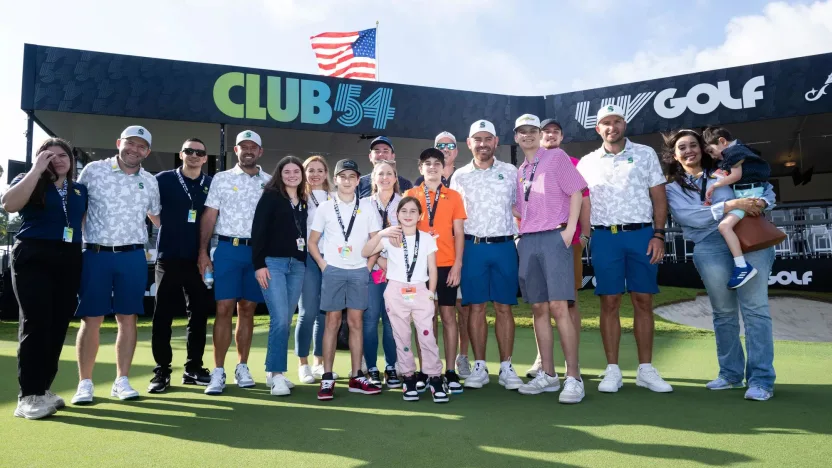 Branden Grace of Stinger GC, Charl Schwartzel of Stinger GC, Captain Louis Oosthuizen of Stinger GC and Dean Burmester of Stinger GC poses for a photo with participants during LIV to Learn activation during the practice round before the start of LIV Golf Miami at the Trump National Doral on Wednesday, April 03, 2024 in Miami, Florida. (Photo by Charles Laberge/LIV Golf)