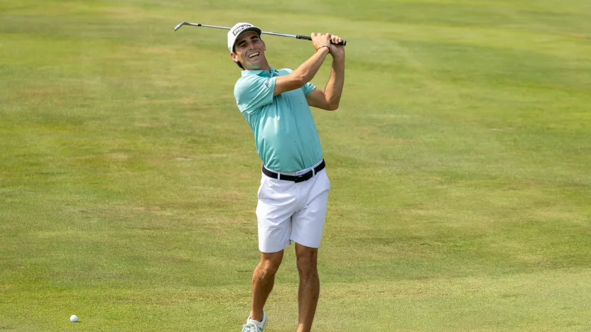 Captain Joaquín Niemann of Torque GC smiles after hitting his shot during the practice round before the start of LIV Golf Chicago at Bolingbrook Golf Club on Tuesday, August 05, 2025 in Bolingbrook, Illinois. (Photo by Jon Ferrey/LIV Golf)
