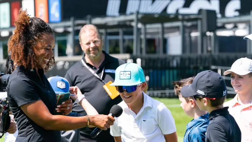 BOLTON, MASSACHUSETTS - AUGUST 30: Participants ask questions during the Bolton Youth Baseball & Softball Youth Clinic for the LIV Golf Invitational at the International Golf Club on August 30, 2022 in Bolton, Massachusetts. (Photo by Hailey Garrett/LIV Golf)
