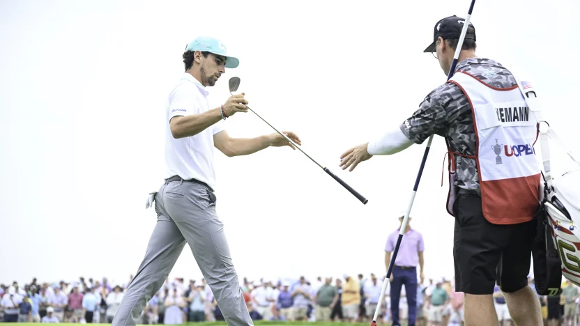 Captain Joaquín Niemann of Torque GC and caddie, Gary Matthews, on the 18th green during the second round of the US Open at Oakmont Country Club on Friday, June 13, 2025 in Oakmont, Pennsylvania. (Photo by Charles Laberge/LIV Golf)