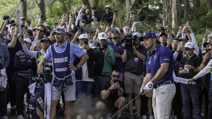 Captain Bryson DeChambeau of Crushers GC hits his shot from the rough on the 16th hole during the final round of LIV Golf Hong Kong at Hong Kong Golf Club Fanling on Sunday, March 09, 2025 in Fanling, Hong Kong. (Photo by Jon Ferrey/LIV Golf)