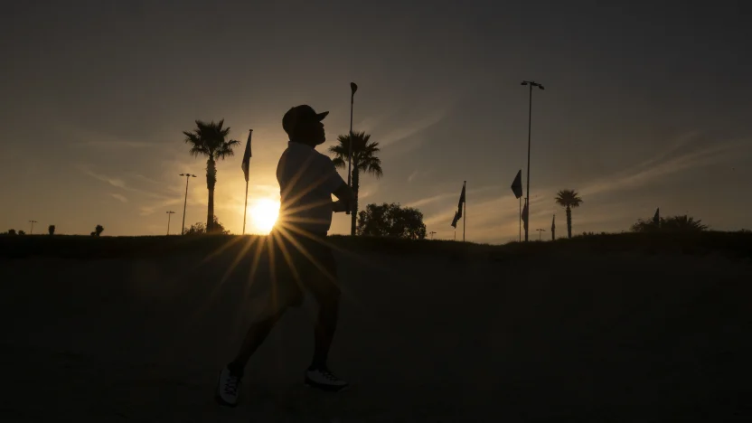 image: Harold Varner III of 4Aces GC warms up before the start of LIV Golf Riyadh at Riyadh Golf Club on Monday, Feb. 03, 2025 in Riyadh, Saudi Arabia. (Photo by Charles Laberge/LIV Golf)