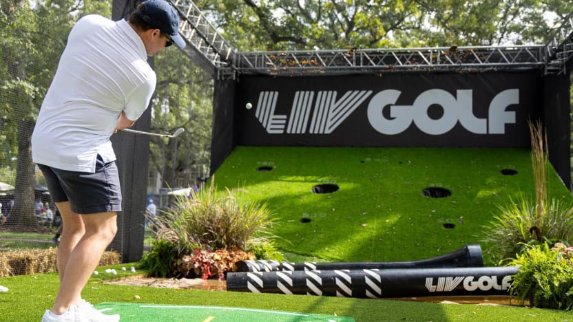 A golf fan participates in the Chipping Challenge in the fan village during the first round of LIV Golf Chicago at the Rich Harvest Farms on Friday, September 22, 2023 in Sugar Grove, Illinois. (Photo by Doug DeFelice/LIV Golf)