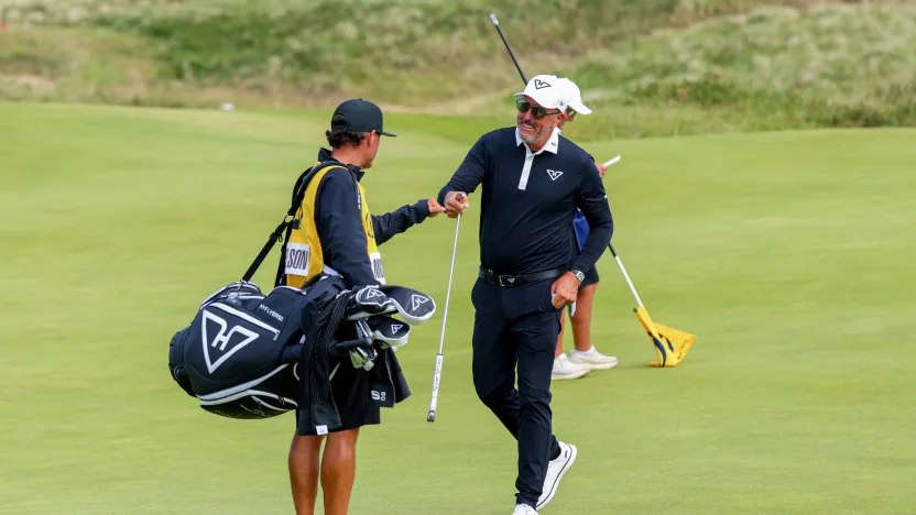 Captain Phil Mickelson of HyFlyers GC fist bumps his caddie, Jon Yarbrough, after his birdie putt on the eighth green during the final round of The Open Championship at Royal Portrush Golf Club on Sunday, July 20, 2025 in Portrush, Northern Ireland. (Photo by Chris Trotman/LIV Golf)