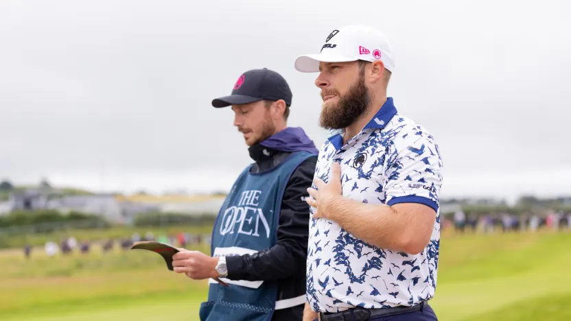 Tyrrell Hatton of Legion XIII and his caddie, Hugo Dobson, wait on the second hole during the second round of The Open Championship at Royal Portrush Golf Club on Friday, July 18, 2025 in Portrush, Northern Ireland. (Photo by LIV Golf)