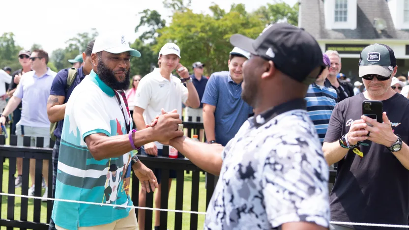 Actor Anthony Anderson shakes hands with Harold Varner III of 4Aces GC on the driving range during the first round of LIV Golf Virginia at Robert Trent Jones Golf Club on Friday, June 06, 2025 in Gainesville, Virginia. (Photo by Mateo Villalba/LIV Golf)