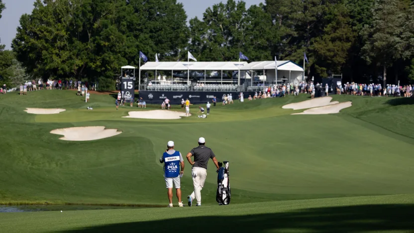 Captain Brooks Koepka of Smash GC and caddie, Ricky Elliot, are seen on the 15th fairway during the first round of the 2025 PGA Championship at Quail Hollow Club on Thursday, May 15, 2025 in Charlotte, North Carolina. (Photo by Jon Ferrey/LIV Golf)