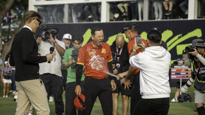 First place individual champion, Captain Sergio Garcia of Fireballs GC celebrates with David Puig of Fireballs GC on the 18th hole after the final round of LIV Golf Hong Kong at Hong Kong Golf Club Fanling on Sunday, March 09, 2025 in Fanling, Hong Kong. (Photo by Charles Laberge/LIV Golf)
