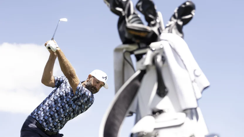 Captain Dustin Johnson of 4Aces GC hits his shot on the driving range during the first round of LIV Golf Andalucía at Real Club Valderrama on Friday, July 11, 2025 in San Roque, Spain. (Photo by Mateo Villalba/LIV Golf)