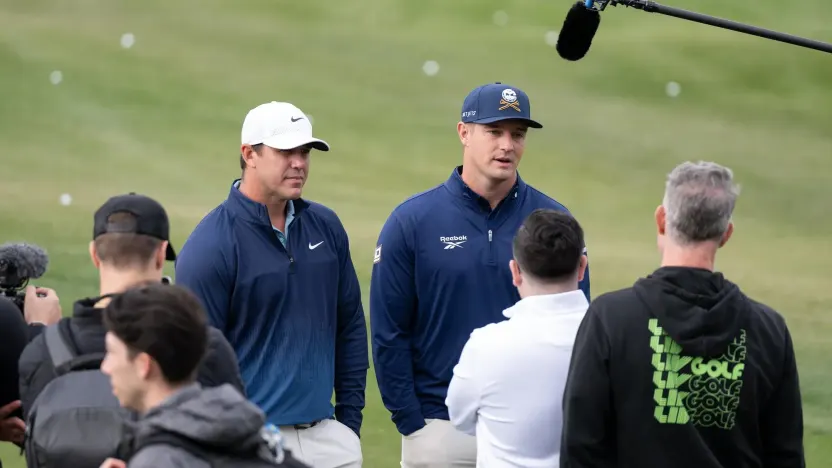 Captain Brooks Koepka of Smash GC and Captain Bryson DeChambeau of Crushers GC speak to the media on the driving range before the Showdown at the Shadow Creek Golf Course on Monday, Dec. 16, 2024 in Las Vegas, Nevada. (Photo by Montana Pritchard/LIV Golf)