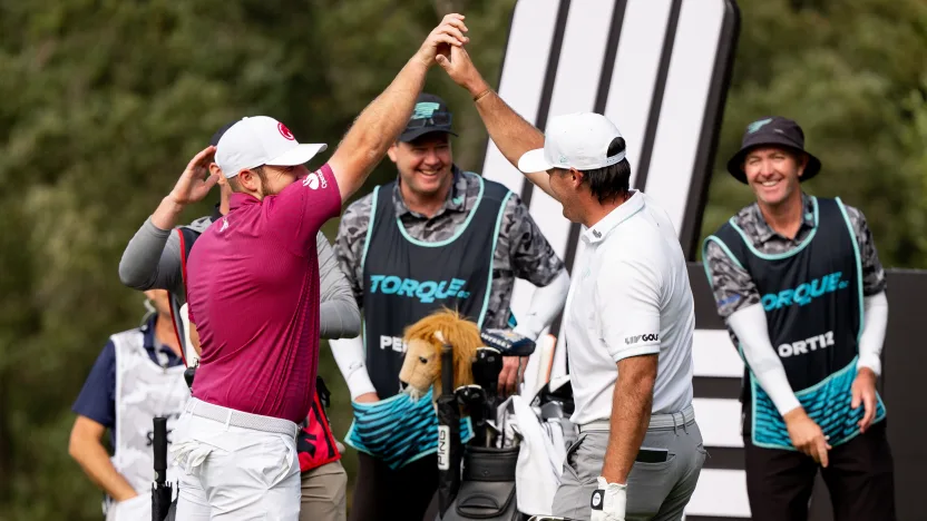 Tyrrell Hatton of Legion XIII and Mito Pereira of Torque GC high fives on the second hole during the second round of LIV Golf Hong Kong at Hong Kong Golf Club Fanling on Saturday, March 08, 2025 in Fanling, Hong Kong. (Photo by Pedro Salado/LIV Golf)