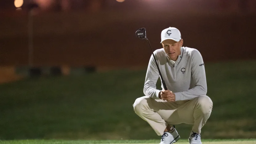 image: Adrian Meronk of Cleeks GC lines his putt on the first green during the second round of LIV Golf Riyadh at Riyadh Golf Club on Friday, February 07, 2025 in Riyadh, Saudi Arabia. (Photo by Mateo Villalba/LIV Golf)