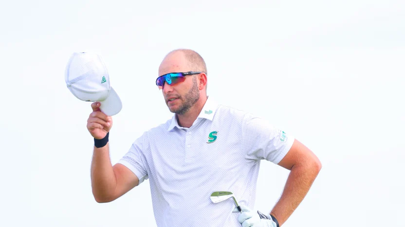 Dean Burmester of Stinger GC tips his cap from the sixth tee during the final round of The Open Championship at Royal Portrush Golf Club on Sunday, July 20, 2025 in Portrush, Northern Ireland. (Photo by Chris Trotman/LIV Golf)