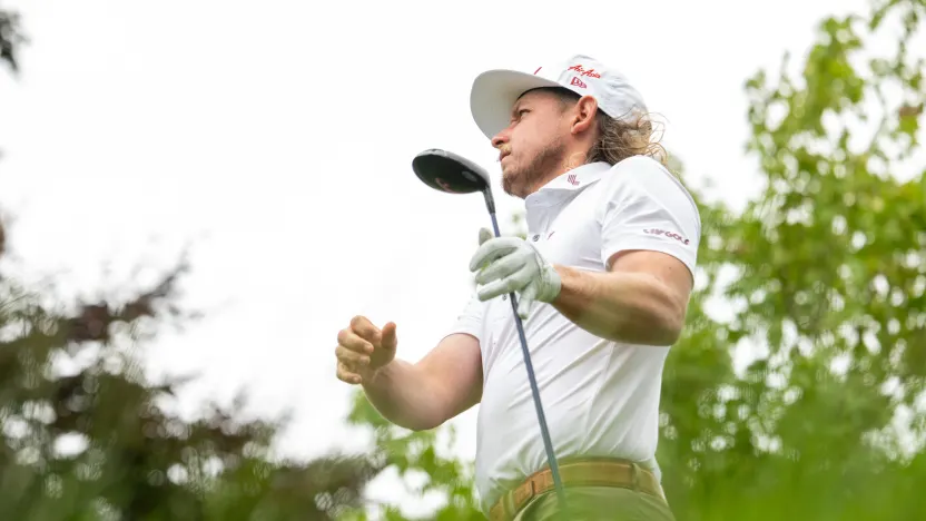 Captain Cameron Smith of Ripper GC hits his shot from the 10th tee during the practice round before the start of LIV Golf United Kingdom by JCB at JCB Golf & Country Club on Tuesday, July 22, 2025 in Rocester, England. (Photo by Charles Laberge/LIV Golf)
