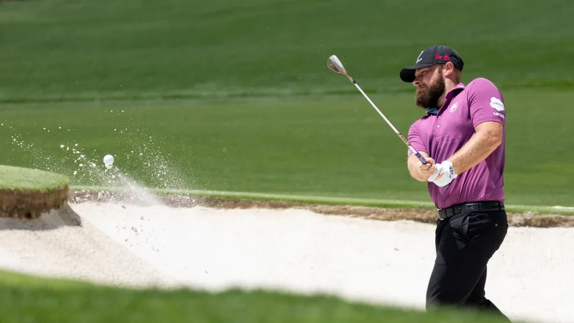 Tyrrell Hatton of Legion XIII hits his shot from a bunker on the fourth hole during the first round of the 2025 PGA Championship at Quail Hollow Club on Thursday, May 15, 2025 in Charlotte, North Carolina. (Photo by Jon Ferrey/LIV Golf)