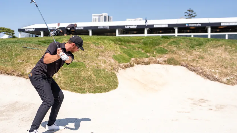 Andy Ogletree of HyFlyers GC hits his shot from a bunker on the 18th hole during the practice round before the start of LIV Golf Korea at Jack Nicklaus Golf Club on Wednesday, April 30, 2025 in Incheon, South Korea. (Photo by Pedro Salado/LIV Golf)