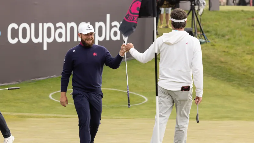 Tyrrell Hatton of Legion XIII fist bumps Captain Bubba Watson of RangeGoats GC on the 18th green during the second round of LIV Golf Korea at Jack Nicklaus Golf Club on Saturday, May 03, 2025 in Incheon, South Korea. (Photo by LIV Golf)