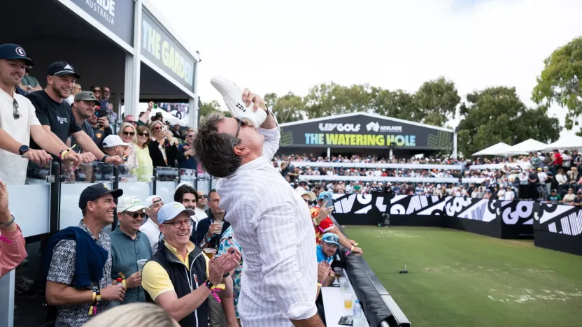 A fan does a shoey on the 12th hole during the second round of LIV Golf Adelaide at the Grange Golf Club on Saturday, April 27, 2024 in Adelaide, Australia. (Photo by Charles Laberge/LIV Golf)