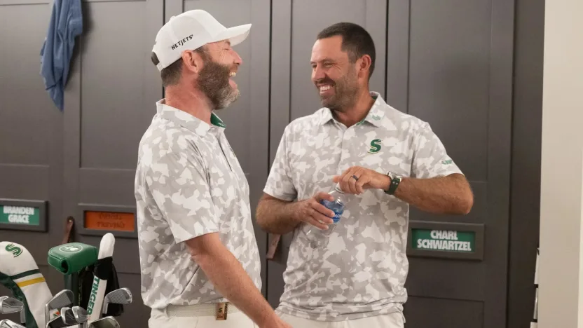 Branden Grace of Stinger GC and Charl Schwartzel of Stinger GC laugh in the locker room before the semifinals of LIV Golf Team Championship Dallas at Maridoe Golf Club on Saturday, September 21, 2024 in Carrollton, Texas. (Photo by Charles Laberge/LIV Golf)