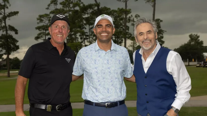 Captain Phil Mickelson of HyFlyers GC poses for a photo with Bunkers in Baghdad President and Founder, Joe Hanna and LIV Golf Broadcast member, David Feherty, during the practice round before the start of LIV Golf Houston at Golf Club of Houston on Wednesday, June 05, 2024 in Humble, Texas. (Photo by Chris Trotman/LIV Golf)