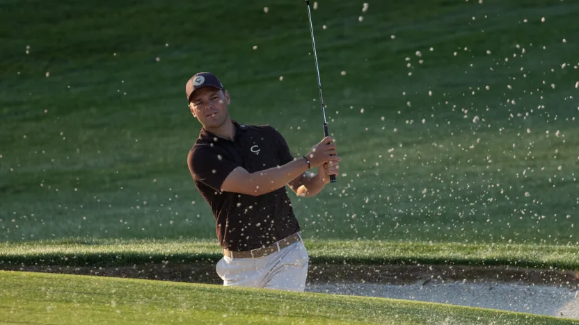 Captain Martin Kaymer of Cleeks GC hits his shot from a bunker on the first hole during the first round of the 2025 PGA Championship at Quail Hollow Club on Thursday, May 15, 2025 in Charlotte, North Carolina. (Photo by Jon Ferrey/LIV Golf)