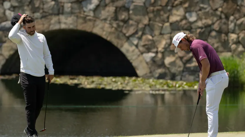 Matthew Wolff of RangeGoats GC watches as Captain Cameron Smith of Ripper GC putts on the fifth green during the final round of LIV Golf Korea at Jack Nicklaus Golf Club on Sunday, May 04, 2025 in Incheon, South Korea. (Photo by Matthew Harris/LIV Golf)