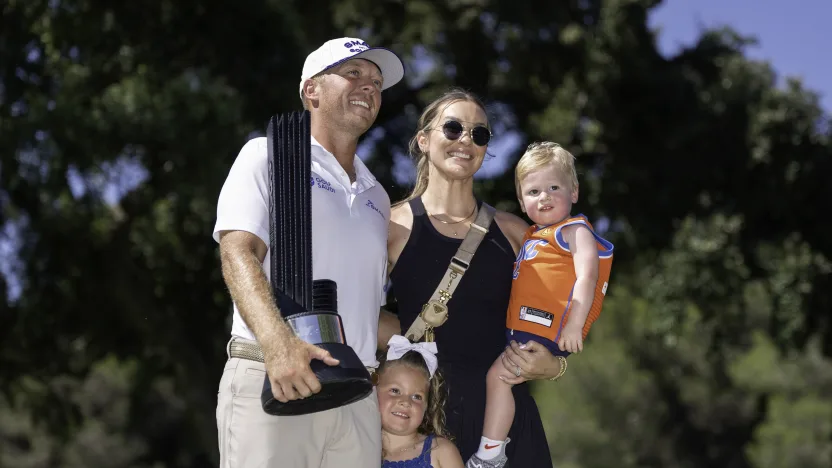 First place individual champion Talor Gooch of Smash GC, wife, Ally Gooch, daughter Collins and son Carter pose for a photo with the trophy after the final round of LIV Golf Andalucía at Real Club Valderrama on Sunday, July 13, 2025 in San Roque, Spain. (Photo by Mateo Villalba/LIV Golf)