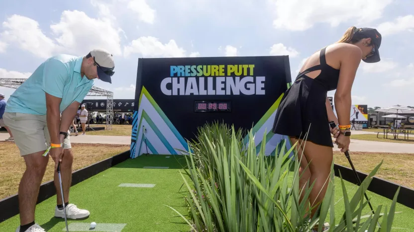 Fans interact with the Pressure Putt Challenge in fan village during the second round of LIV Golf Houston at Golf Club of Houston on Saturday, June 08, 2024 in Humble, Texas. (Photo by Katelyn Mulcahy/LIV Golf)
