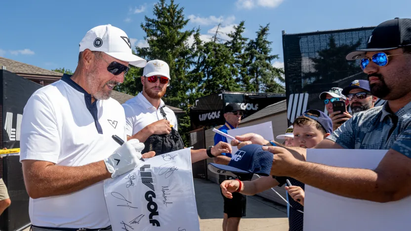 Captain Phil Mickelson of HyFlyers GC signs autographs before the start of the quarterfinals of LIV Golf Team Championship Michigan at The Cardinal at Saint John’s on Friday, August 22, 2025 in Plymouth, MIchigan. (Photo by Charles Laberge/LIV Golf)