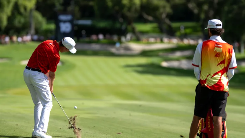David Puig of Fireballs GC hits his shot on the tenth hole as caddie, Alberto Sanchez, looks on during the second round of LIV Golf Andalucía at Real Club Valderrama on Saturday, July 12, 2025 in San Roque, Spain. (Photo by Matthew Harris/LIV Golf)