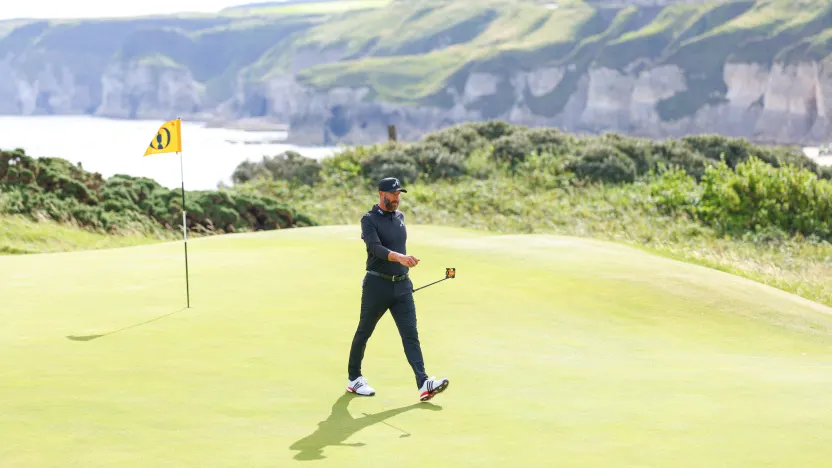 Captain Dustin Johnson of 4Aces GC walks on the fifth green during the first round of The Open Championship at Royal Portrush Golf Club on Thursday, July 17, 2025 in Portrush, Northern Ireland. (Photo by Chris Trotman/LIV Golf)