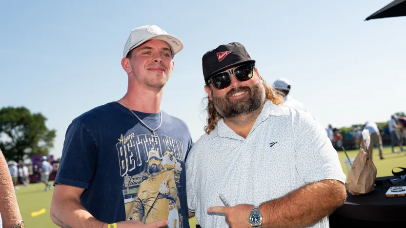 Content creator, Fat Perez, poses for a photo with fans during the Meet the Creators on the driving range before the start of the first round of LIV Golf Dallas at Maridoe Golf Club on Friday, June 27, 2025 in Carrollton, Texas. (Photo by Mateo Villalba/LIV Golf)